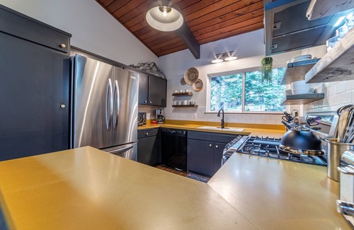 Mammoth Lakes House | Summer Getaways Available! Remodeled Townhome with Seasonal Pool, Fireplace, and Grill!