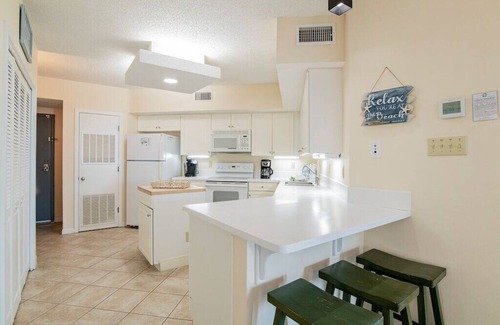 Orange Beach Condo | Summer House 106B | Ground floor, wrap around deck, direct beach front!