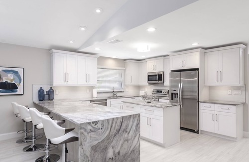 Naples Park House | SUMMER SPECIALS! Luxury Home, Stunning Large Pool/Spa, Near Beaches, FREE Bikes