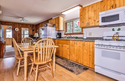 Lac du Flambeau Cabin | Summer waterfront cabin with firepit, private dock, washer/dryer, AC, & kayaks