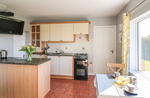 Youghal Apartment | SUMMERFIELD LODGE COTTAGE, with a garden in Youghal, County Cork