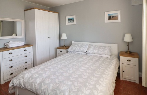 Youghal Apartment | SUMMERFIELD LODGE COTTAGE, with a garden in Youghal, County Cork