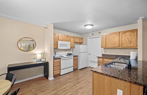 West Des Moines Apartment | Sun Deck | Pool | Gym | and More!