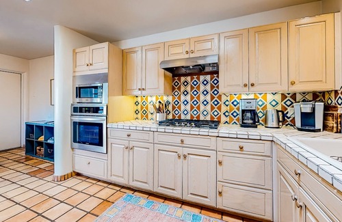 Quail Run House | Sun-soaked stay with community amenities, fireplace, grill, & al fresco dining