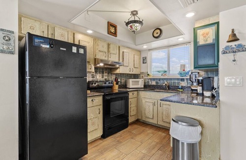 New Smyrna Beach Condo | Sunlit Corner Beachfront Retreat Walk to Flagler & Ocean Views