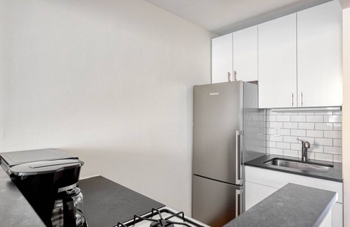 Bowery Apartment | Sunlit East Village 1BR w/W/D, nr First Park, by Blueground