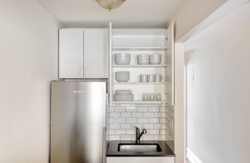 Bowery Apartment | Sunlit East Village 1BR w/W/D, nr First Park, by Blueground