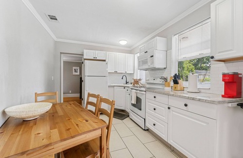 Old Seminole Heights House | Sunny 2 Bedroom Home with Backyard and Front Porch in Seminole Heights