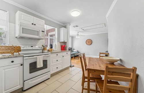 Old Seminole Heights House | Sunny 2 Bedroom Home with Backyard and Front Porch in Seminole Heights