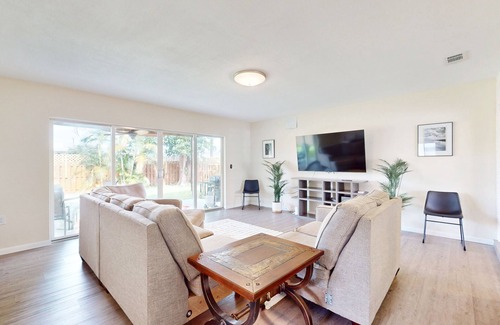 Driftwood House | Sunny abode in an ideal location with yard, grill, alfresco dining, open layout