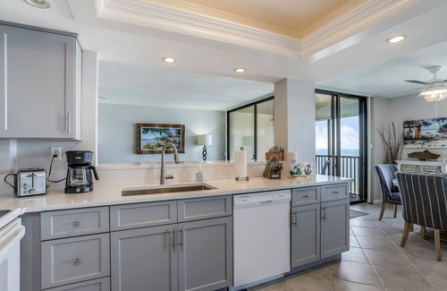 Vanderbilt Beach Condo | Sunny and serene oceanfront condo with pool, tennis, lanai, & washer/dryer