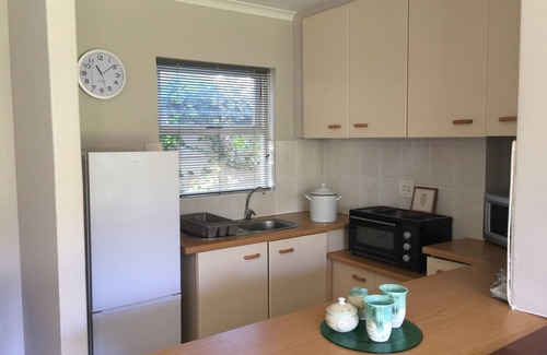Tokai Cottage | Sunny and spacious garden cottage, close to beaches and wine farms.
