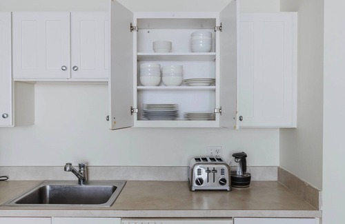 Theatre District Apartment | Sunny Downtown 2BR, A/C & Elevator, by Blueground