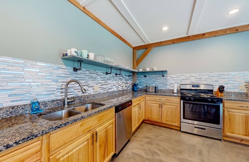 Ellsworth House | Sunny duplex near forests and lakes with open layout, smart TV, & washer/dryer