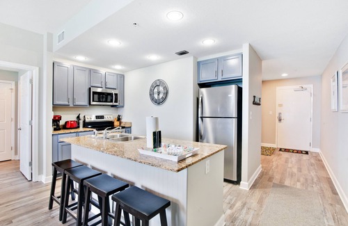 Panama City Beach Condo | Sunny getaway at the beach with furnished balcony, pool & fitness room