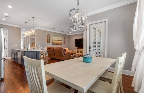 Villa Lago House | Sunny getaway with 2 golf carts, patio, grill, pool, & tennis
