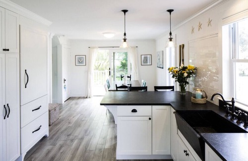 Camden House | Sunny gourmet kitchen lovely gardens near village harbor library restaurants