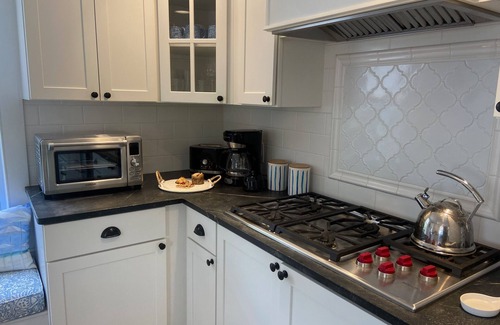 Camden House | Sunny gourmet kitchen lovely gardens near village harbor library restaurants