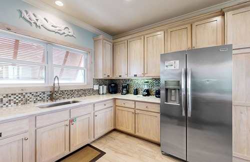 Gulf Shores House | Sunny Home Near the Beach w/Balcony, Partial Beach Views, Shared Outdoor Pool