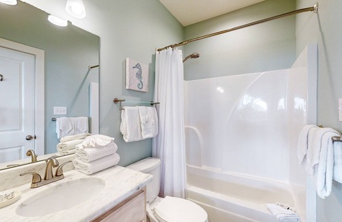 Gulf Shores House | Sunny Home Near the Beach w/Balcony, Partial Beach Views, Shared Outdoor Pool