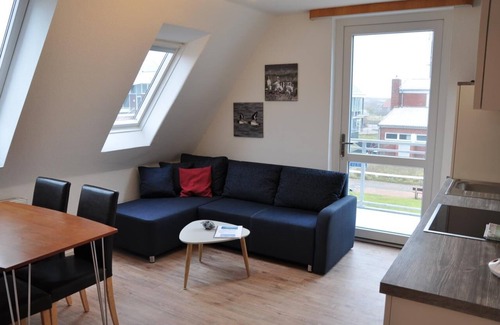Baltrum Apartment | Sunny island apartment with balcony and close to the beach, 2 bed.