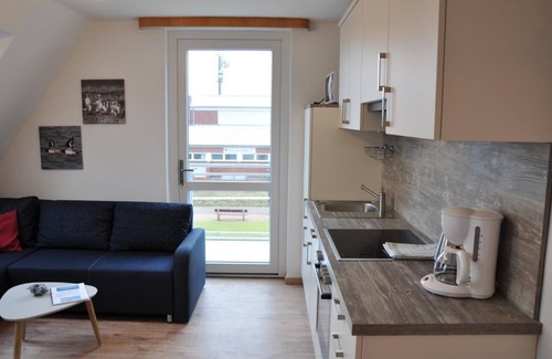 Baltrum Apartment | Sunny island apartment with balcony and close to the beach, 2 bed.
