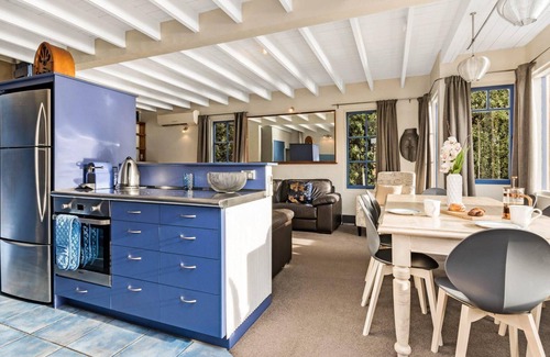 Kelvin Heights House | Sunny Lakeview Villa | Outdoor living | Hot Tub