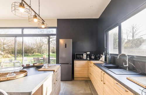 Lessay Cottage | Sunny Modern Home with Large Terrace, Near Greenway and Village Shops
