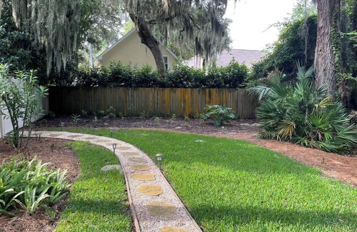 St. Simons Island House | Sunny Saint Simons home with unique open floor plan, privacy and pool
