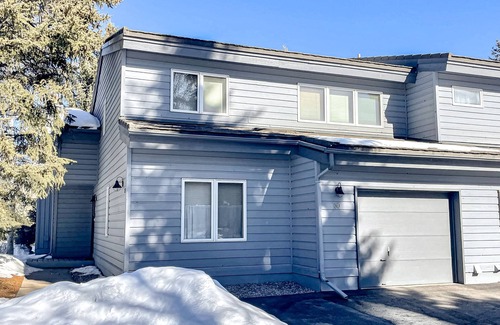 Edwards House | Sunny two-story townhouse with fireplace plus pool, hot tub, sports courts