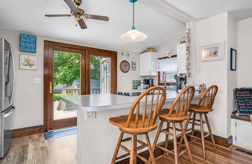 Chincoteague House | Sunset Bay Cottage - Main Street charm with water views!