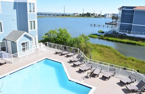 Chincoteague Condo | Sunset Bay Villa 210-Downtown Waterfront Sunsets