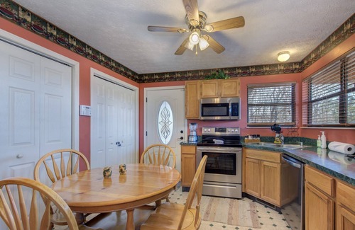 Sevierville Cabin | Sunset Breeze | Luxury Lakeside Cabin- Private Dock+ Hot Tub