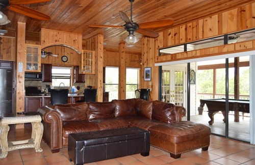 Palm Island House | Sunset Gulf views from your porch with a private dock.