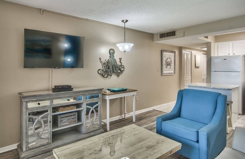 Holiday Isle Condo | SUNSET JETTY VIEW! ENJOY 1 FREE BEACH CHAIR SET UP & UMBRELLA EACH DAY