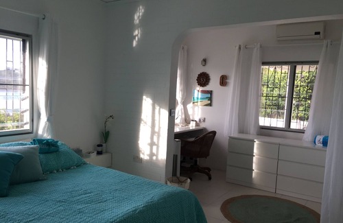 Sandy Ground Cottage | Sunset views over Sandy Ground