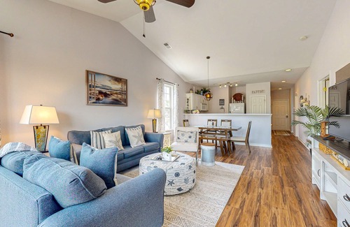 Sunset Beach Condo | Sunset Village top-floor end unit with golf & pond views, pools & hot tub