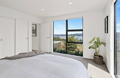 Mahurangi West House | Sunsets in the Spa at Ti Point - Your Beautiful, Modern, and Warm, City Escape