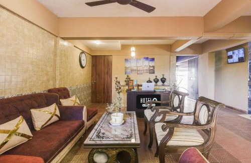 Holy Cross Colony Hotel | Super Hotel O Dabolim Near Goa International Airport