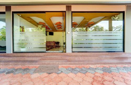 Peringandoor Hotel | Super Hotel O Thrissur Near Thrissur Medical College