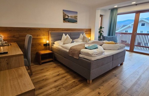 Seeboden Bed & Breakfast | Superior Doppelzimmer Goldeck mit Südbalkon - Gästehaus Bärwald