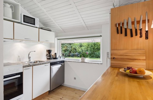 Farvang House | Surrounded by waters, forests and meadows, this friendly cottage welcomes you.