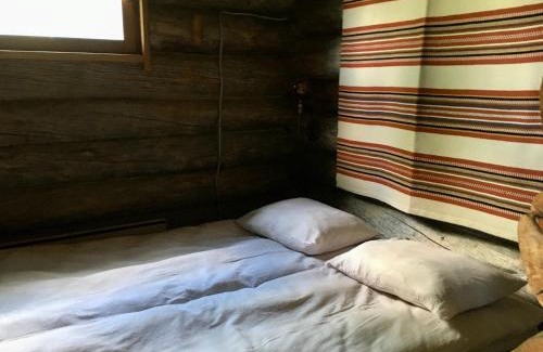 Rovaniemi Ski Chalet | Suvantokoto Riverside Log Cabin