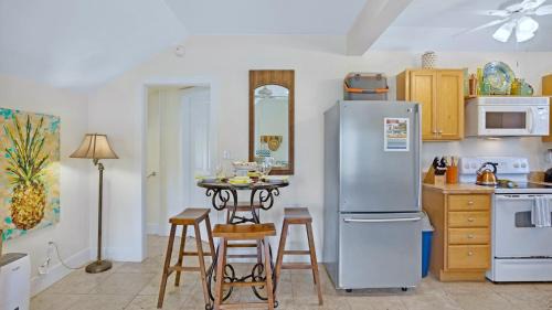 Uptown - Upper Duval Apartment | Suzys Parrot Perch by Last Key Realty