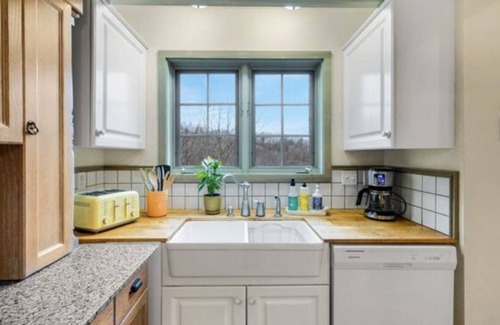 La Crosse House | Swedish Storybook in bluffs hiking trails & stream