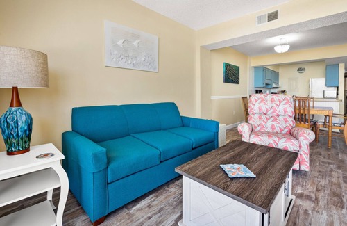 Windy Hill Condo | Sweeping sands & awesome views at oceanfront condo w/beachfront pool, expansive balcony