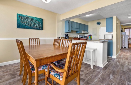 Windy Hill Condo | Sweeping sands & awesome views at oceanfront condo w/beachfront pool, expansive balcony