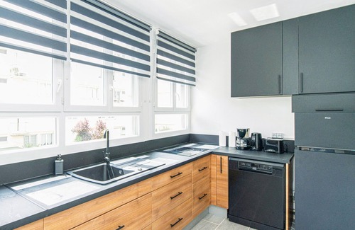 Le Plessis-Robinson Apartment | "SweetMoulinHome" is a warm and inviting space!