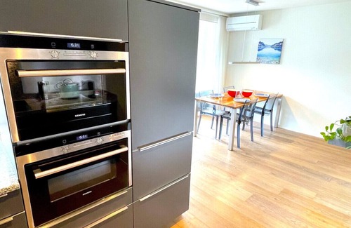 Unterseen Condo | SwissHut Modern 10min Interlaken West Station - Apart. Blume 1