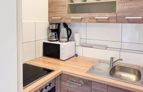 Krefeld Apartment | T&K Apartments - Krefeld - 1 Zimmer Apartment mit schönem Gartenblick - 25min FAIR DUS